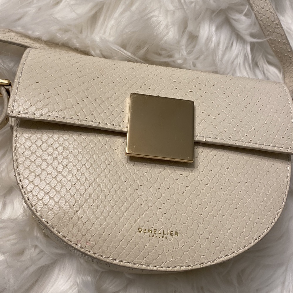 Demellier Oslo cream color snakeskin crossbody leather handbag.